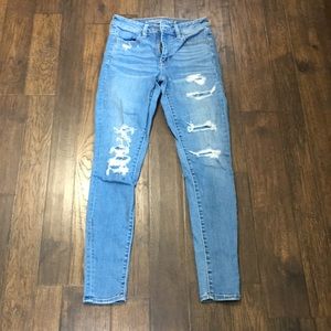 Light blue ripped jeans